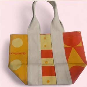 Sol De Janeiro Mini Tote Bag. Orange, Yellow, Red